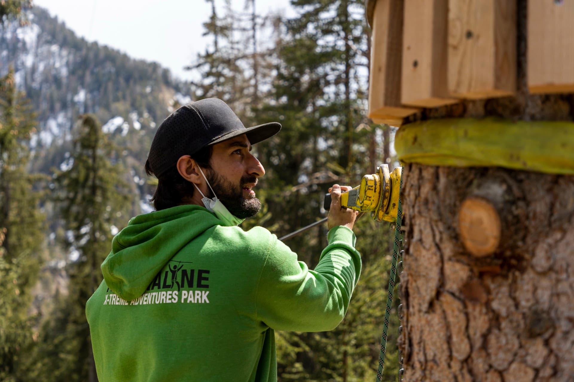 Construction of the zipline park structures in the Dolomites mountains